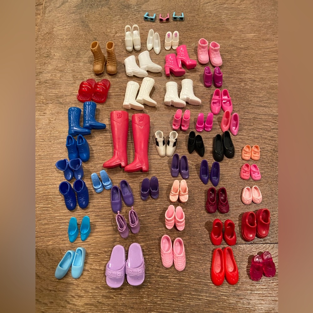 45 pairs of Barbie shoes and others. 3‎ pairs of sunglasses